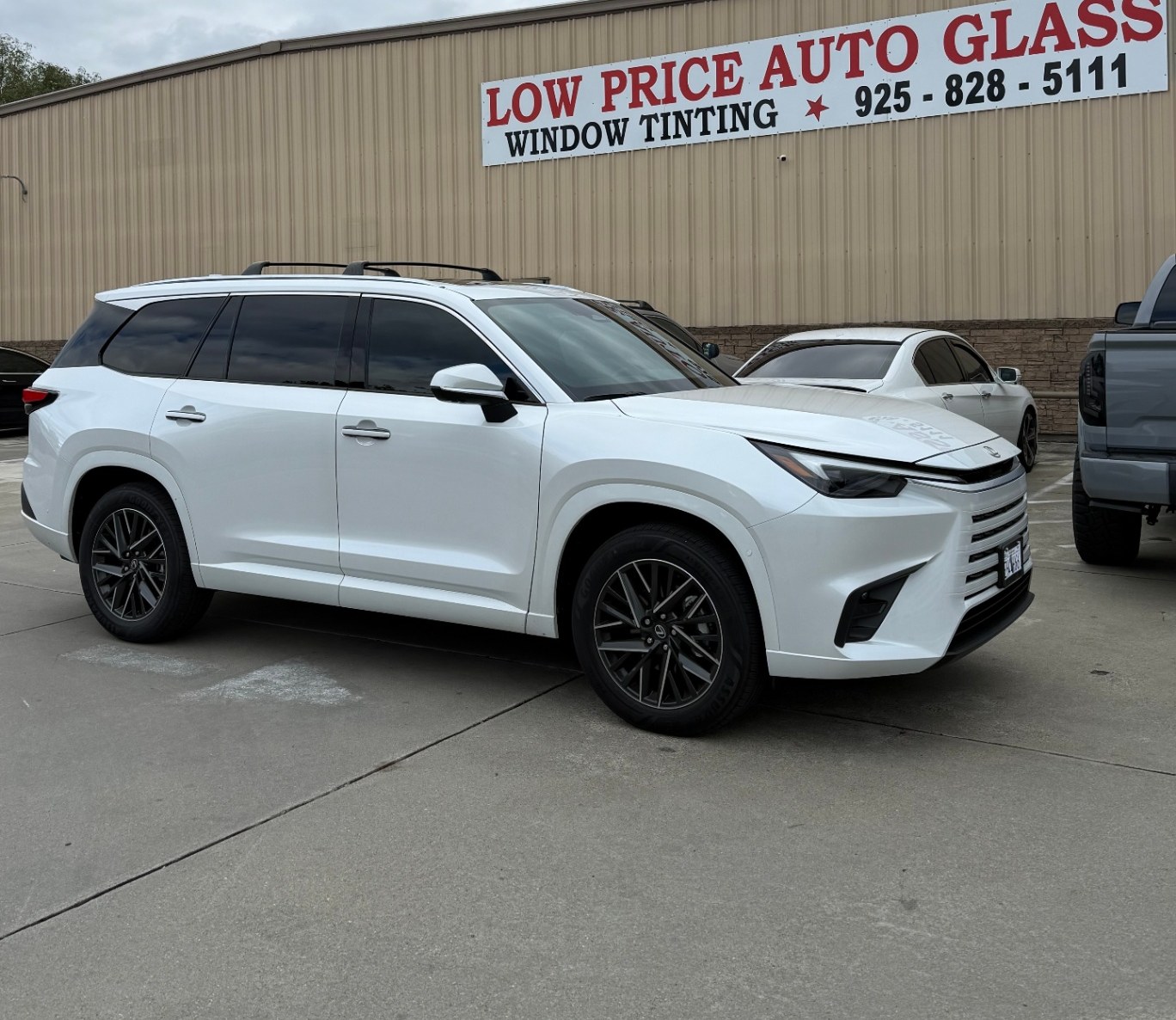 Lexus TX with ceramic window tint front-quarter view